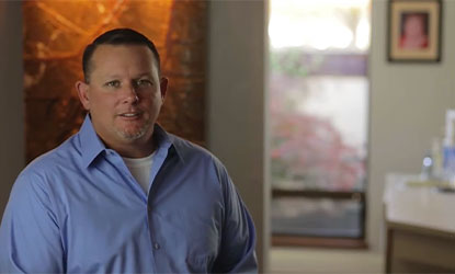 Dr. Wayne's patient explaining his dental treatment experience